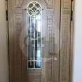 двустворчатая стальная дверь в загородный дом